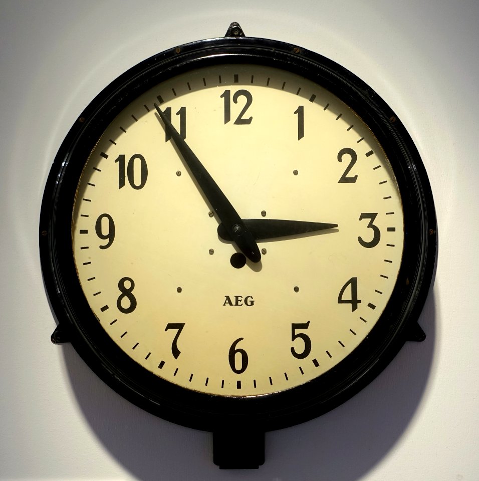 Outdoor clock, designed by Peter Behrens, AEG, Berlin, c. 1910, metal case - Museum Künstlerkolonie Darmstadt - Mathildenhöhe - Darmstadt, Germany - DSC06377