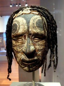 Overmodeled ancestor skull, Middle Sepik, Iatmul people, 19th to early 20th century, human hair and skull, shell, wax, clay - De Young Museum - DSC01025