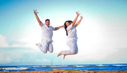 Newlyweds jump enjoyment