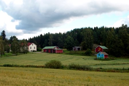 Painted murals on farm buildings in Vesijako, Padasjoki, Finland