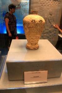 Painted prunus vase with rust pattern on display in Shenzhen Museum