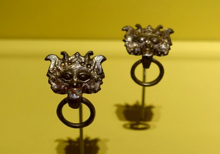 Pair of mask-and-ring ornaments, China, Han dynasty, 2nd century BC to 2nd century AD, gilt bronze - Portland Art Museum - Portland, Oregon - DSC08645