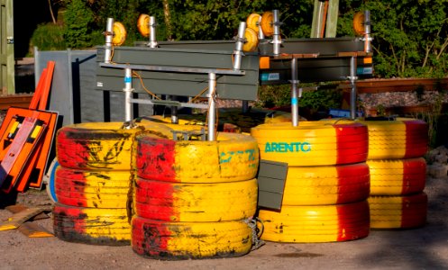 Painted tires witrh signs used at road construciton