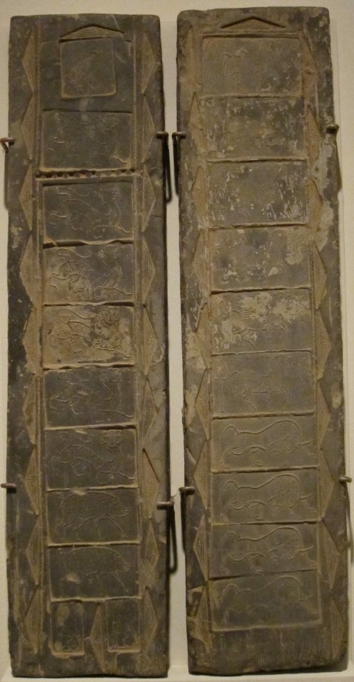 Pair of tiles with animal designs, China, Han dynasty, ceramic, Honolulu Museum of Art