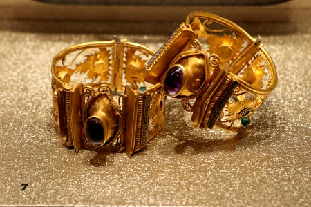 Pair of gold bracelets with precious stones. 1st cent. B.C