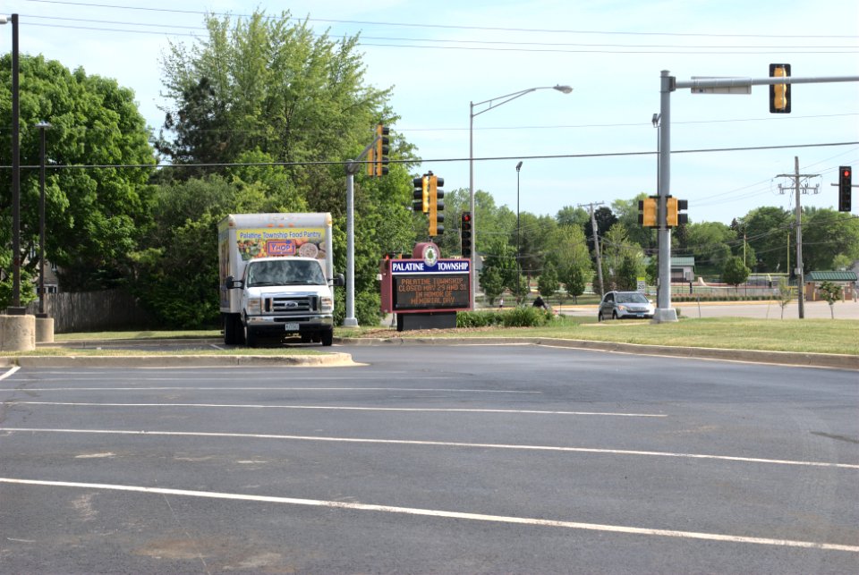 Palatine Township Center sign and food pantry truck