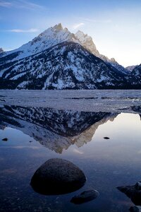 Snow mountain lake reflection
