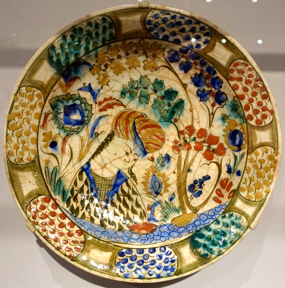 Plate with youth amid flowering plants, Iran, Isfahan, Safavid period, c. 1600-1630 AD, fritware painted under glaze - Sackler Museum - Harvard University - DSC01920