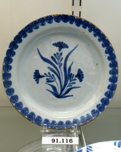 Plate, attributed to Delftfield Factory, Glasgow, Scotland, 1740-1750, tin-glazed earthenware, item HD 91.116 - Flynt Center of Early New England Life - Deerfield, Massachusetts - DSC04257