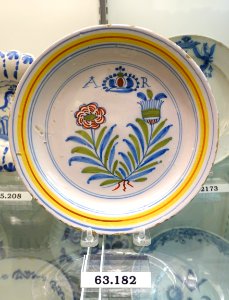 Plate with Queen Anne's initials above rose and thistle, London, England, 1707-1714, tin-glazed earthenware, HD 63.182 - Flynt Center of Early New England Life - Deerfield, Massachusetts - DSC04371
