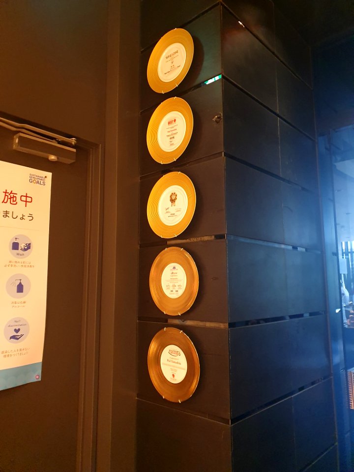 Plates (awards?) at entrance of restaurant in Tokyo Midtown