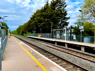 Platform 2 from Platform 1 of Castle Bar Park station, 2021 photo