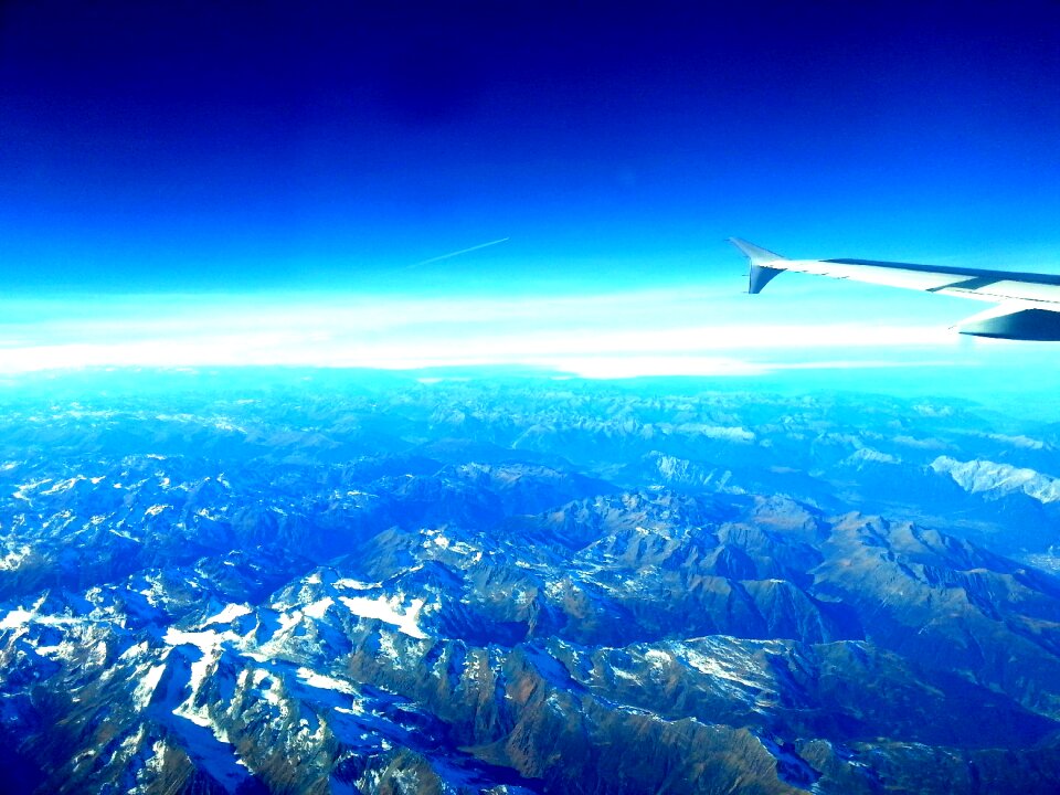 Aircraft window mountains