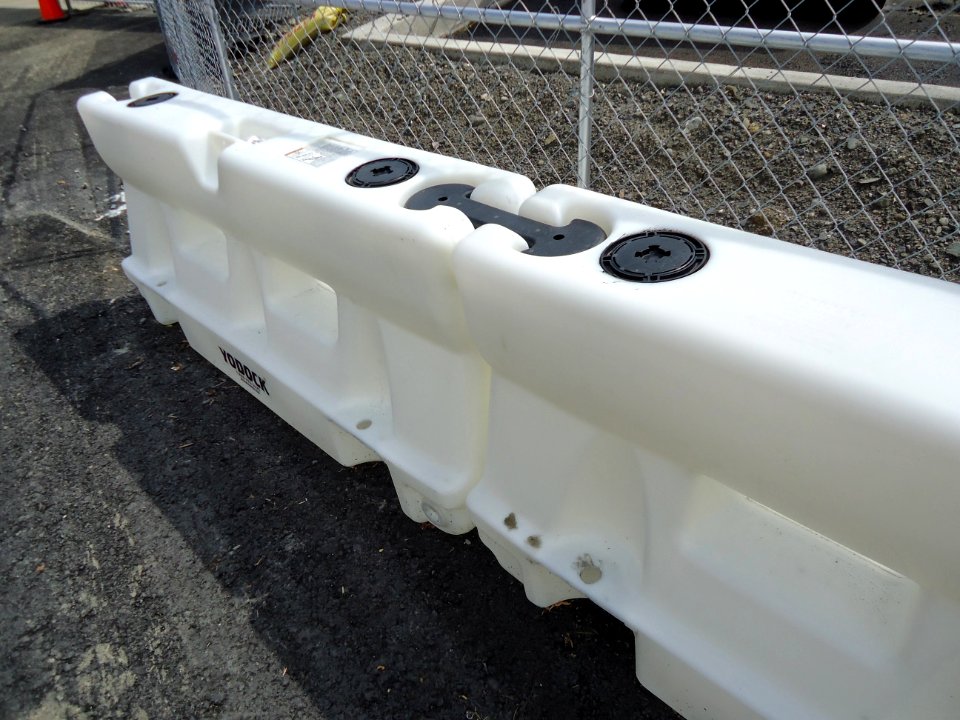 Plastic road barriers can be connected filled with water emptied