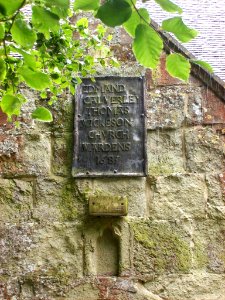 Plaque, north porch, Hellingly church