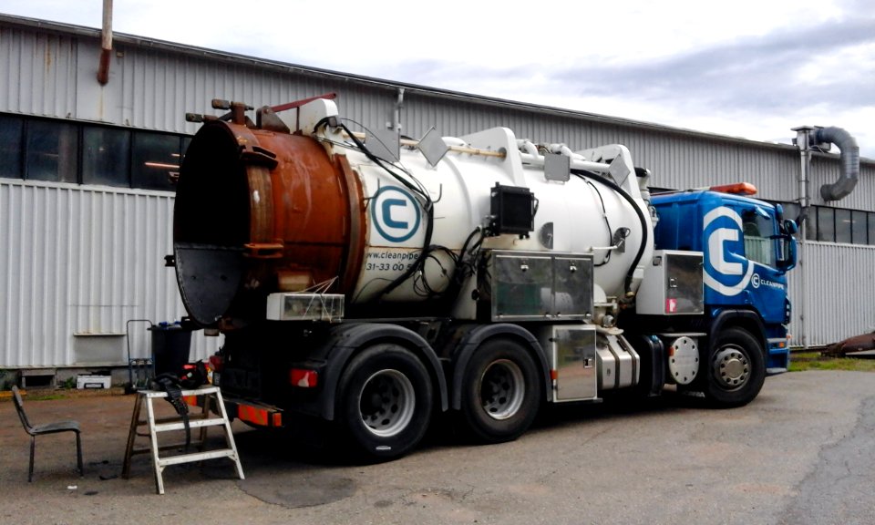 Pipe cleaning truck open for repair 1