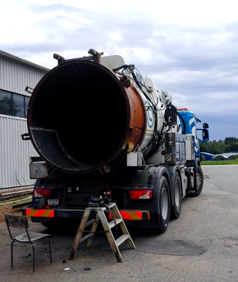 Pipe cleaning truck open for repair 2