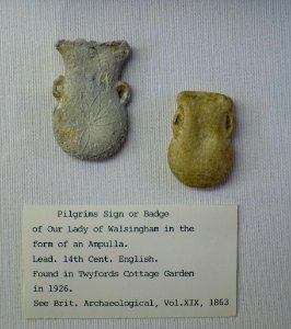 Pilgrim badges in the form of ampullas, Our Lady of Walsingham, 14th century, England, lead - Museum, Haddon Hall - Bakewell, Derbyshire, England - DSC02958