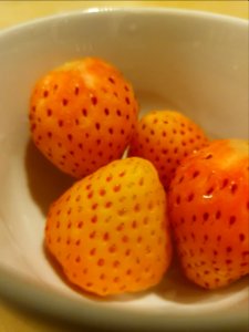 Pink-yellow strawberries in Tokyo photo