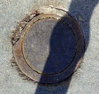 Plain disk in grid ring street hole cover - Beacon Hill - Boston, MA - DSC02230