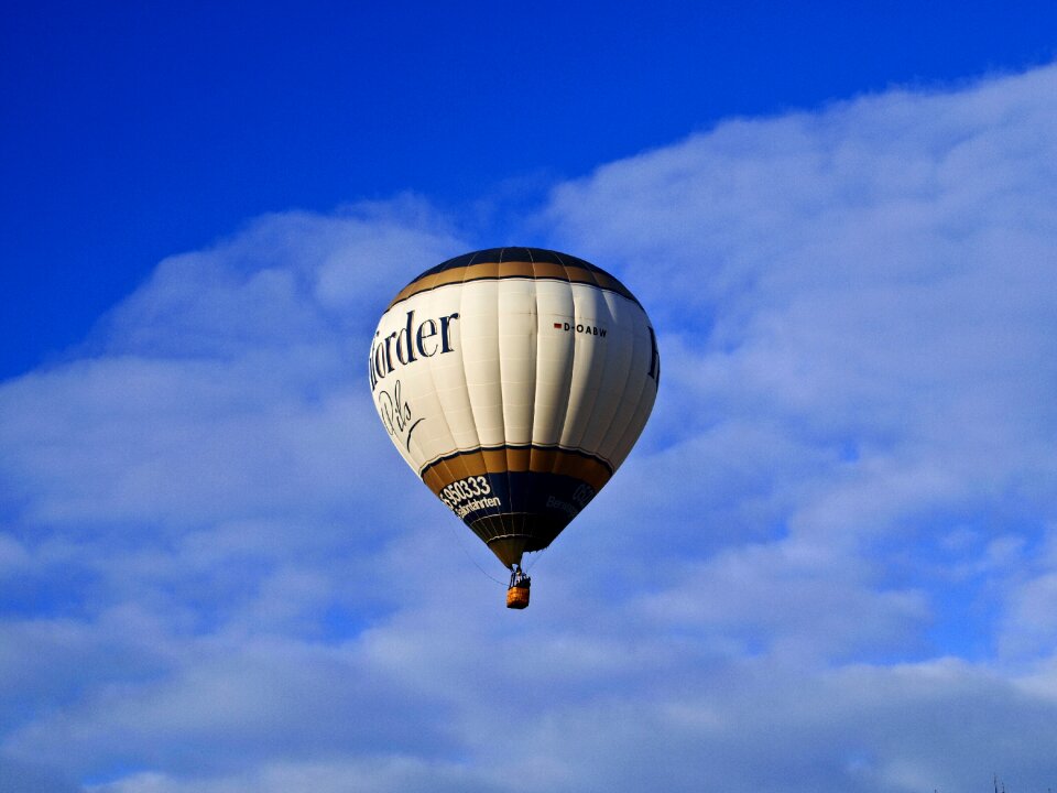 Ballooning clouds hot air balloon