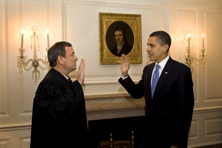 Administers the oath a second time with barack obama