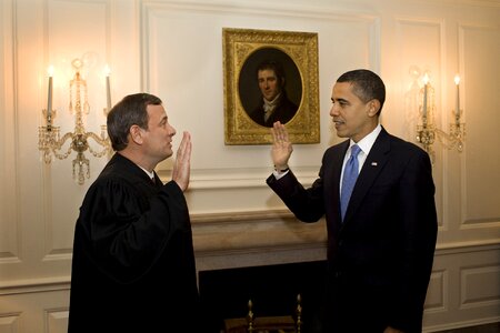 Administers the oath a second time with barack obama photo