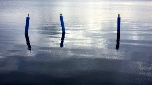 Pole-shaped mooring buoys in Lahälla