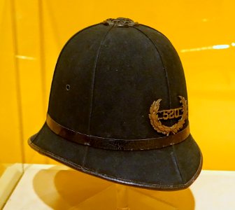 Policeman's helmet, c. 1890, wool felt, cotton, leather, metal - Château Ramezay - Montreal, Canada - DSC07620
