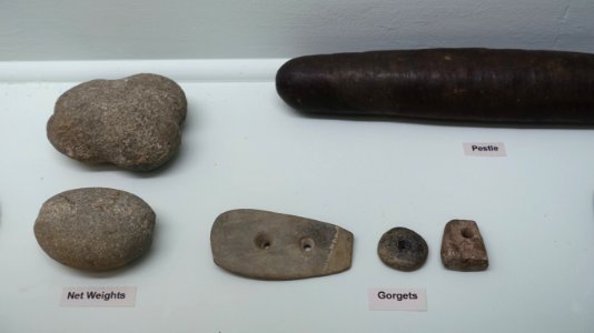 Pestle, net weights, and gorgets - Middle Woodland collection - Robbins Museum - Middleborough, Massachusetts - DSC03840
