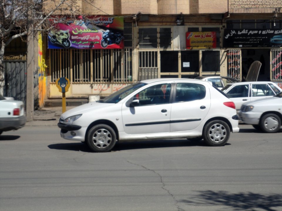 Peugeot 206 - white - Taleghani blv - Nishapur
