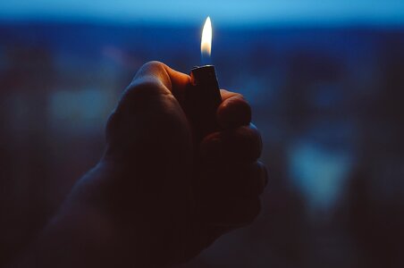 Holding light flame