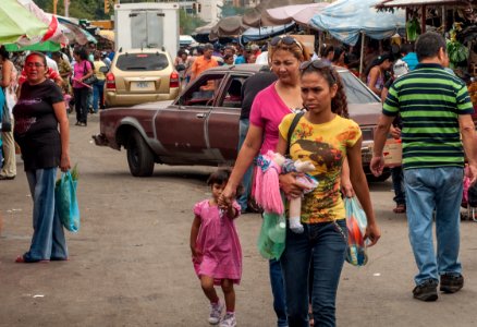 People walking in Maracaibo center photo