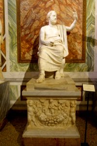 Periander as a Greek scholar, Roman, head 130-140 AD, statue 1st century AD, base 140-150 AD from a sarcophagus with Nereids bearing the arms of Achilles, marble - Galleria Borghese - Rome, Italy - DSC04882
