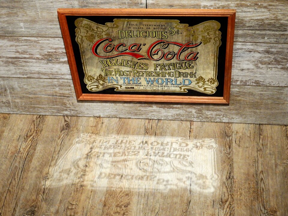 Advertisement mirror old