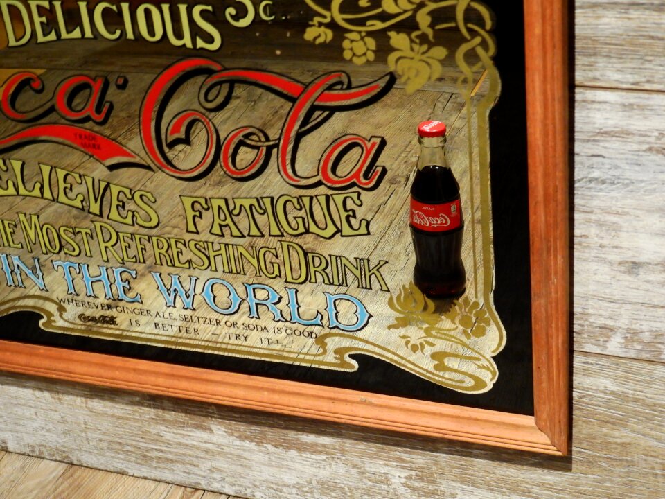 Advertisement mirror old