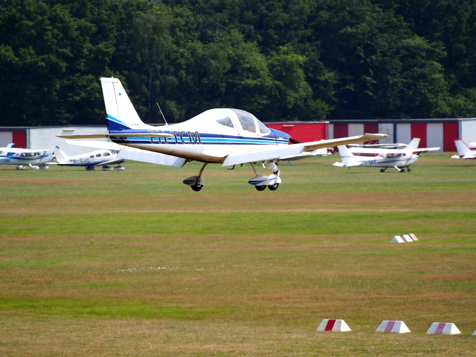 PH-TCM, Tecnam P2002 Sierra landing at Hilversum Airport (ICAO EHHV), photo4