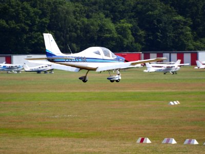 PH-TCM, Tecnam P2002 Sierra landing at Hilversum Airport (ICAO EHHV), photo4