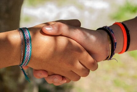 Shaking hands friendship adolescents