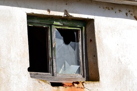 Broken glass old wall