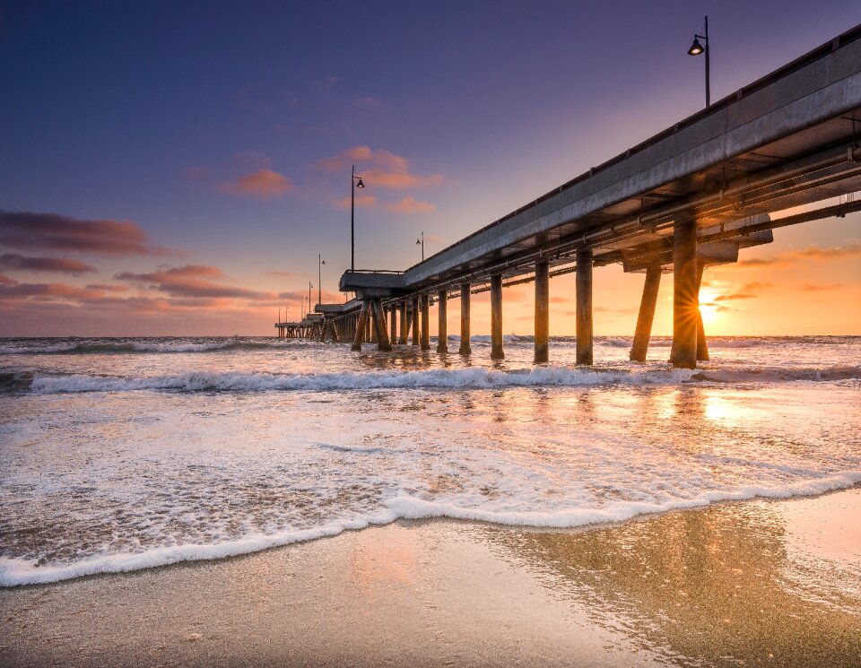 Ocean pier sand photo