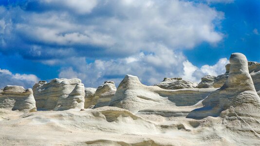 Blue sky clouds white mountains photo