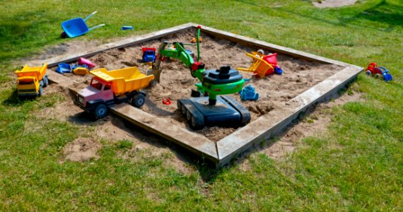 Sandbox with toys on Röe gård 2 photo