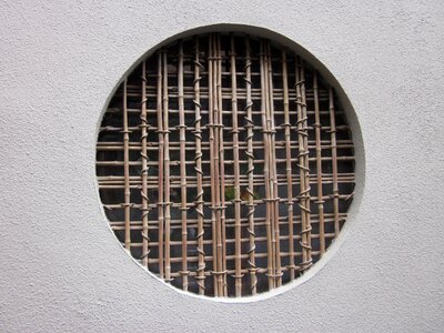 Round window mud wall bamboo