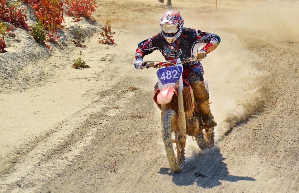 Dust motocross rider