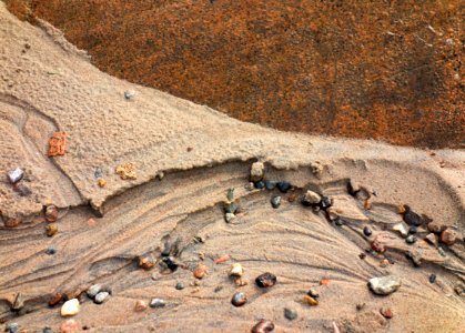 Sand formed by water below a cliff in Govik 3