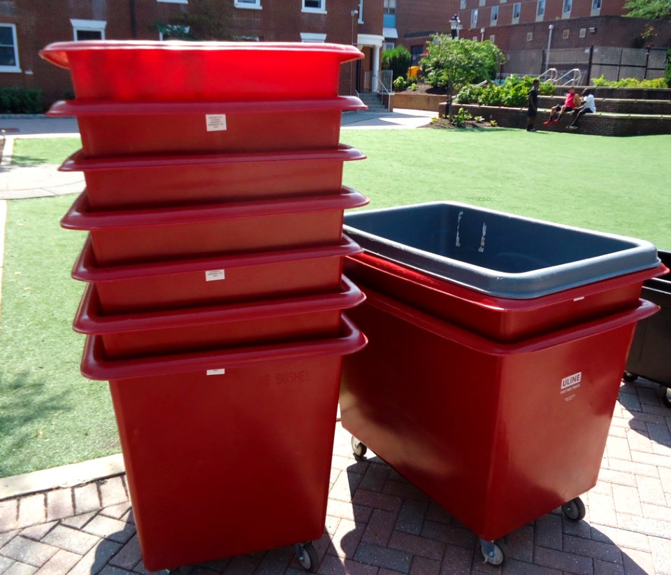 Rutgers University bins with wheels for moving students belongings from cars to rooms