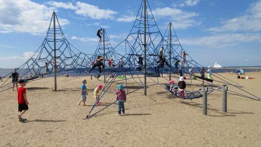Beach children play racks