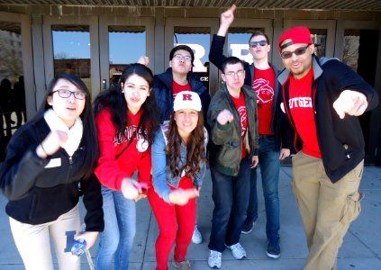 Rutgers University student guides performing RU rah rah cheer