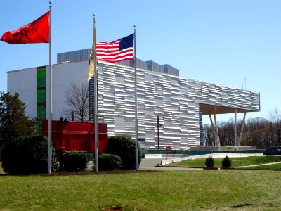 Rutgers University Livingston campus building with flags